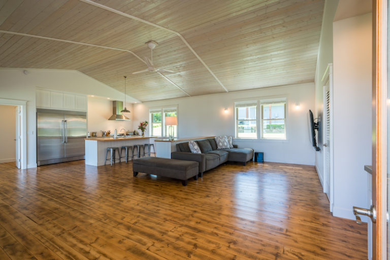 The open floor plan of the living room and the kitchen of 1809 Haiku Road