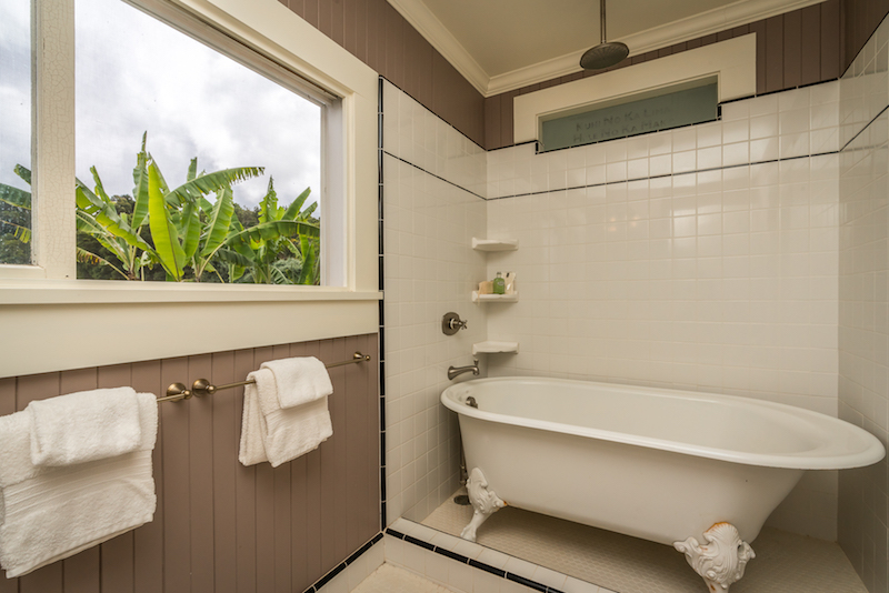 A clawfoot tub in a classic Hawaii Plantation Style Home in Kula