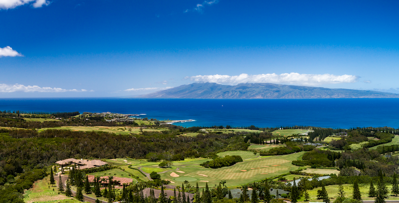 Aerial view of Plantation Estates in Kapalua with Molokai in the distance across the channel. 