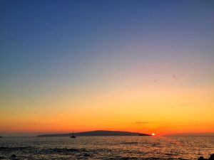 The sun sets just off the tips of Kaho'olawe and Molokini