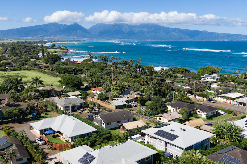 Aerial View of 21 Meha in Kuau with the coastline and West Maui Mountains in the background