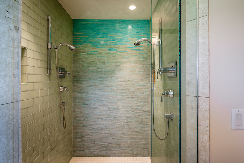 Custom glass tile work in one of the bathrooms
