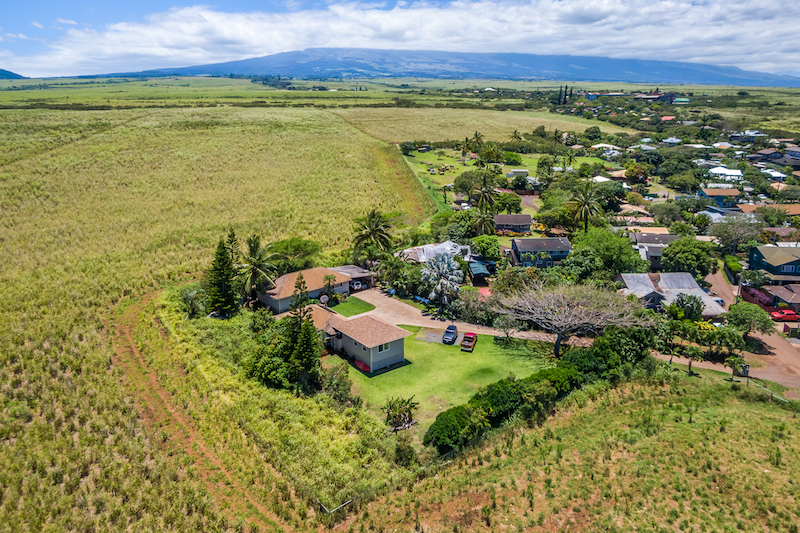 This aerial perspective shows how the property is surrounded on three sides by Agricultural land. 